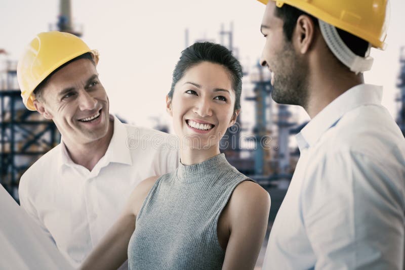 Composite image of happy architect discussing over blueprint stock photos Composite image of happy architect discussing over blueprint stock photos