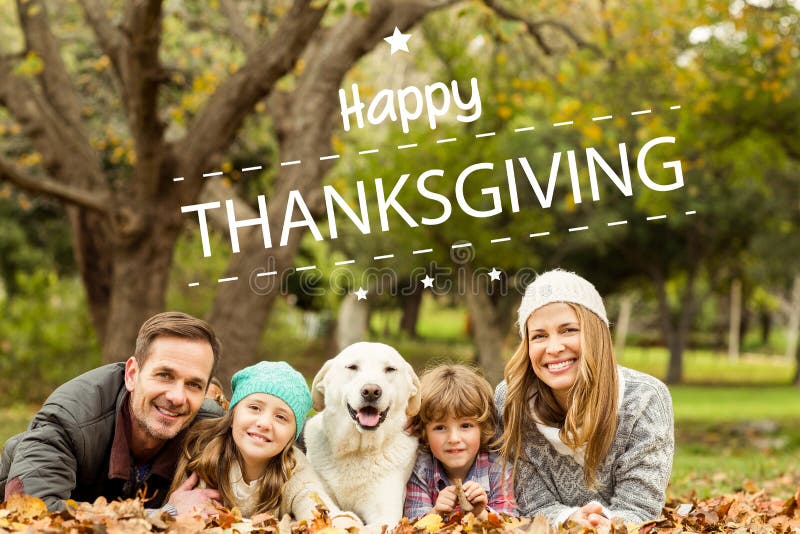 Happy thanksgiving against young family with a dog. Happy thanksgiving against young family with a dog