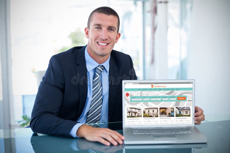 Composite image of portrait of smiling businessman showing laptop royalty free stock images
