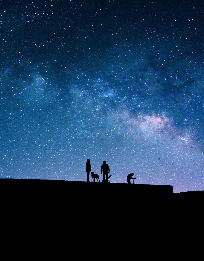 Milky Way and silhouettes of people. royalty free stock photo Milky Way and silhouettes of people. royalty free stock photo