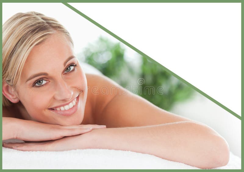 Composition of amiling woman lying on towel over white background stock image