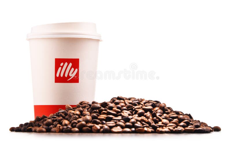 Composition Avec La Tasse De Café Et De Haricots D'Illy