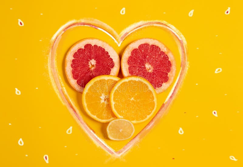 Composition of Citrus Fruit, Orange and Lemon on Yellow Background