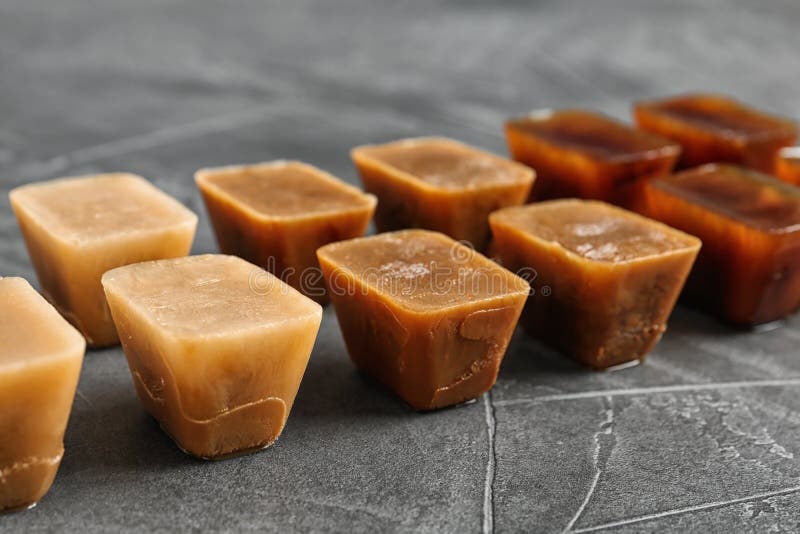 Composition with coffee ice cubes on grey table royalty free stock photography Composition with coffee ice cubes on grey table royalty free stock photography