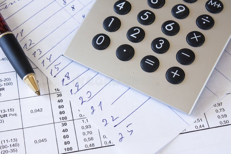 Financial composition on the table with money, calculator and pen. Financial composition on the table with money, calculator and pen