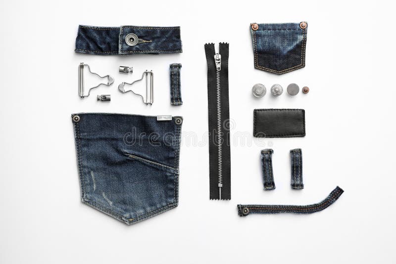 Composition with Garment Accessories and Cutting Details for Jeans
