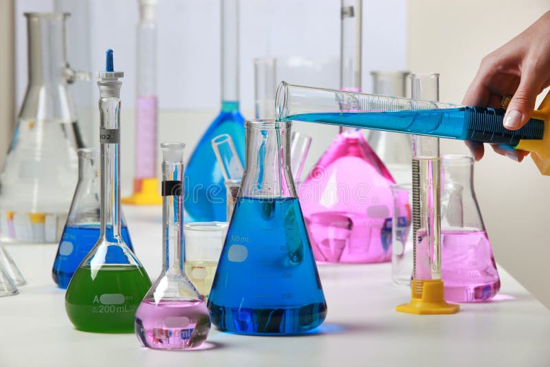 Composition of laboratory material with colored liquids in realistic glass pots chemical test for soy and corn. stock photos Composition of laboratory material with colored liquids in realistic glass pots chemical test for soy and corn. stock photos