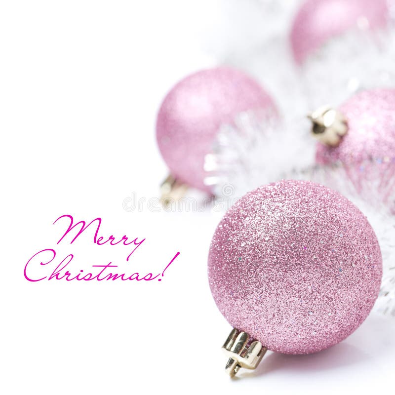 Composition with pink Christmas balls and tinsel, isolated