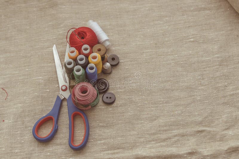 Sewing Thread and for Knitting the Gray Thread and the Needle and the