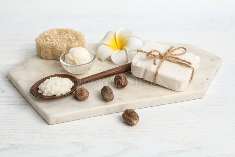 Composition with Shea butter and nuts royalty free stock photos