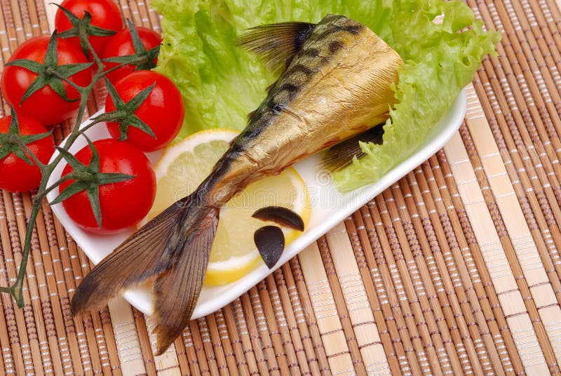 Composition from a smoked mackerel on a plate