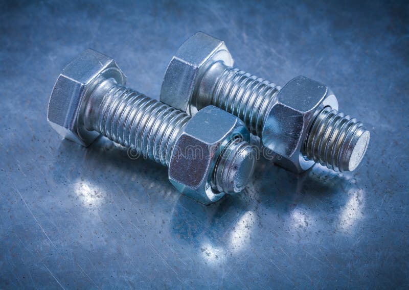 Composition Of Threaded Bolts And Construction Nuts On Metallic Stock