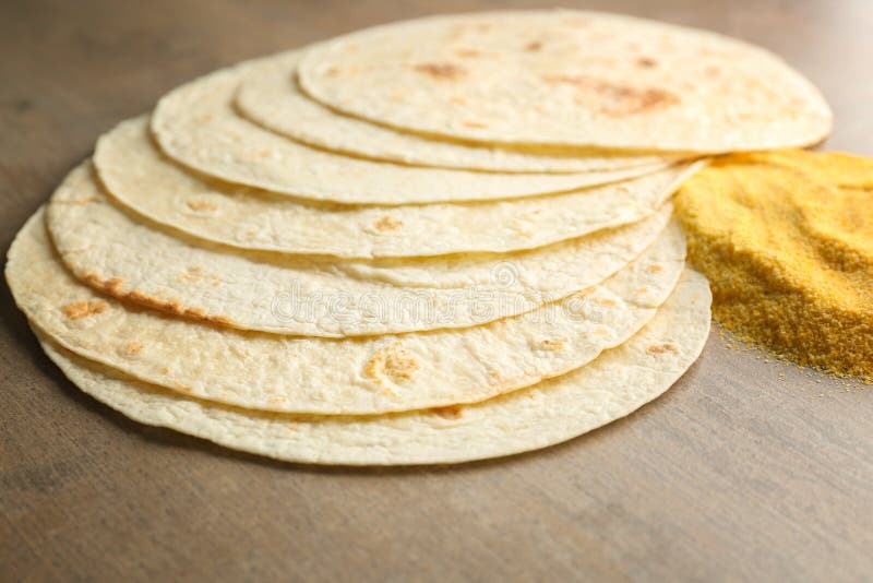 Composition with unleavened tortillas and corn flour royalty free stock photo Composition with unleavened tortillas and corn flour royalty free stock photo