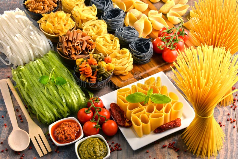 Composition with Variety of Pasta on Kitchen Table Stock Photo Image