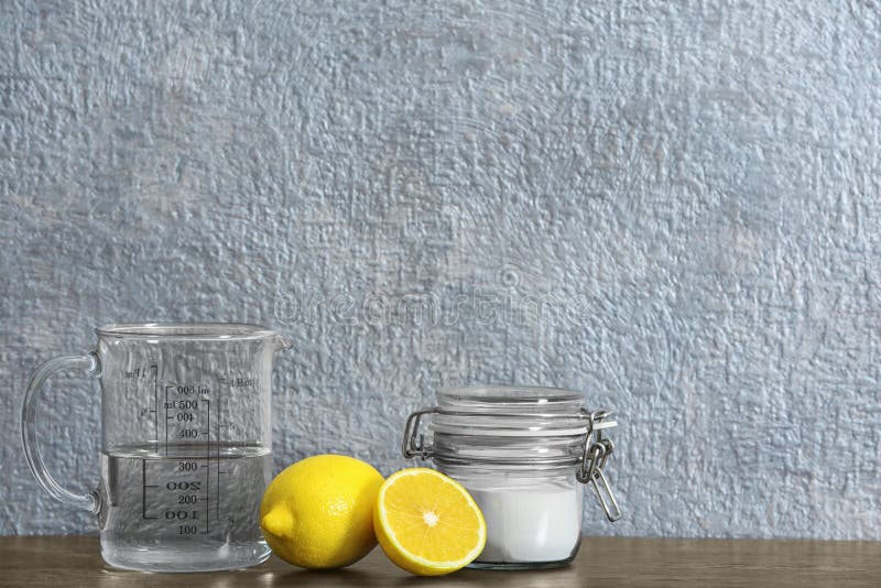 Composition with vinegar, lemons and baking soda on table. stock image Composition with vinegar, lemons and baking soda on table. stock image