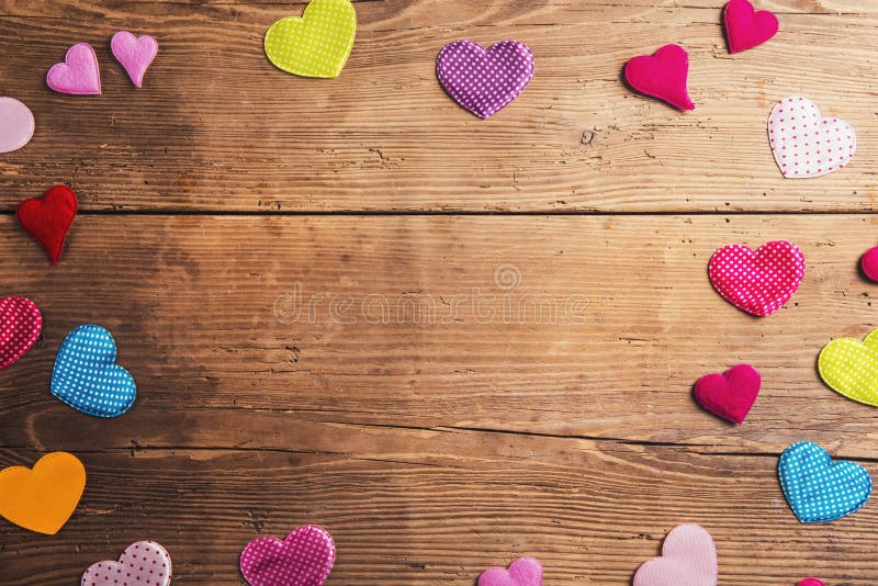 Fathers day composition - textile hearts on the floor. Studio shot on wooden background. Fathers day composition - textile hearts on the floor. Studio shot on wooden background.