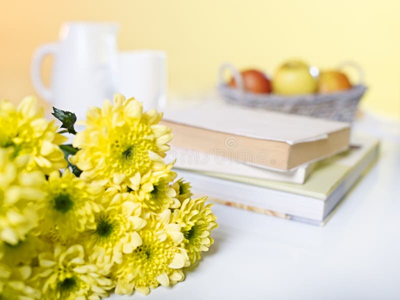 Composition with morning flowers and books. Composition with morning flowers and books