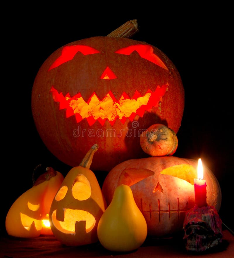 Halloween and autumn composition. Pumpkins and candles. Halloween and autumn composition. Pumpkins and candles