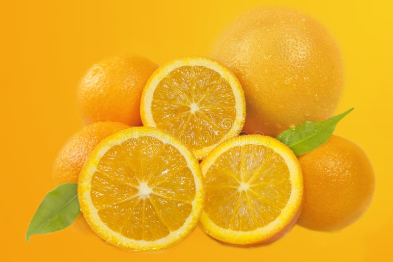 Composition of fresh oranges with green leaves. Composition of fresh oranges with green leaves
