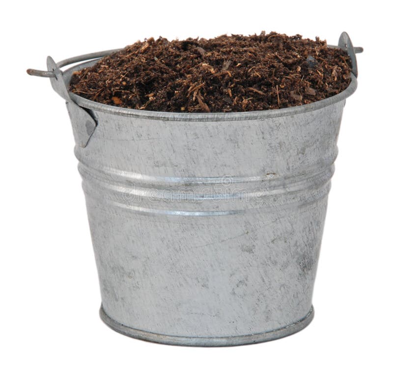Composta/suolo/sporcizia in un secchio miniatura del metallo