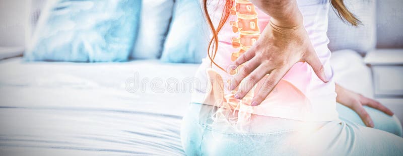 Digital composite of highlighted spine of woman with back pain at home. Digital composite of highlighted spine of woman with back pain at home