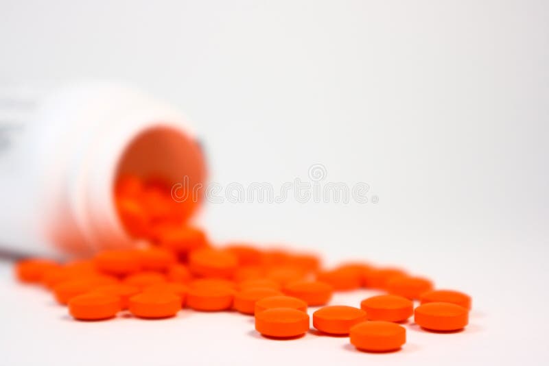 Comprimidos alaranjados imagem de stock Comprimidos alaranjados imagem de stock