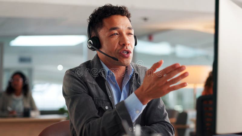 Computer, call center agent and man with technical support, question or problem solving. IT hotline, technology and stock image