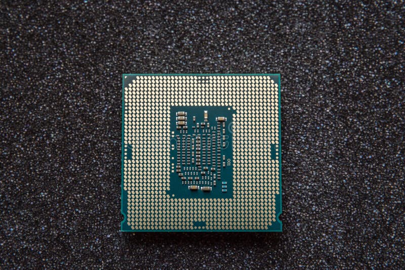 Computer cpu (central processor unit) chip on mainboard royalty free stock photos