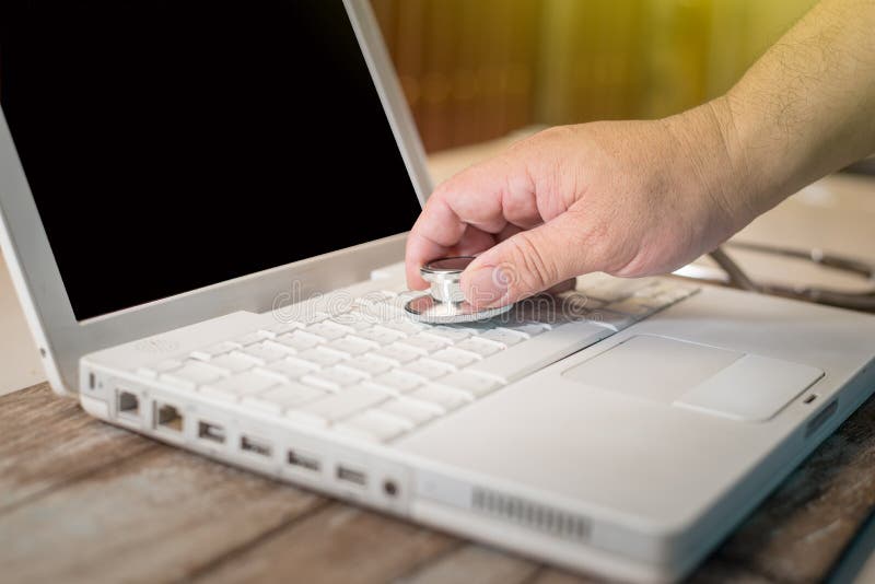 Computer or data analysis - Stethoscope over a laptop computer royalty free stock photo