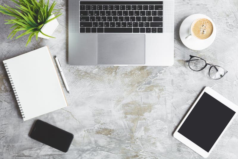 Computer device on work table top view royalty free stock photos
