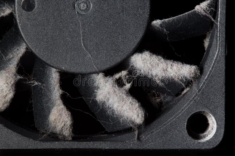 Computer fan with blades covered with a layer of dust