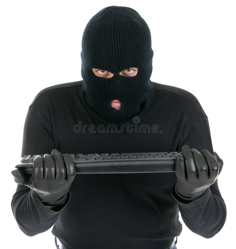 Computer hacker - criminal with the keyboard royalty free stock image