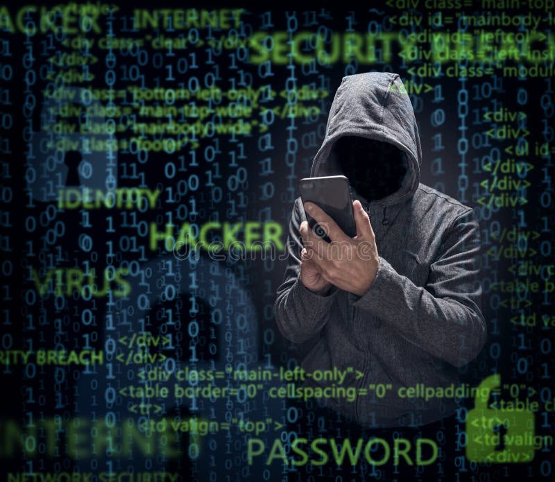 Computer hacker with mobile phone stealing data royalty free stock image