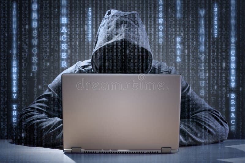 Computer hacker stealing data from a laptop royalty free stock photos