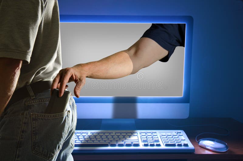 Il furto di identità succede 19 volte ogni minuto di ogni giorno, ed è illustrata qui con un uomo di ottenere il suo portafoglio è stato rubato da una mano a venire fuori lo schermo del computer come si alza e si allontana dal suo computer.