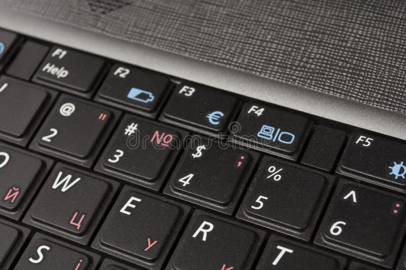 Closeup of black modern computer laptop keyboard