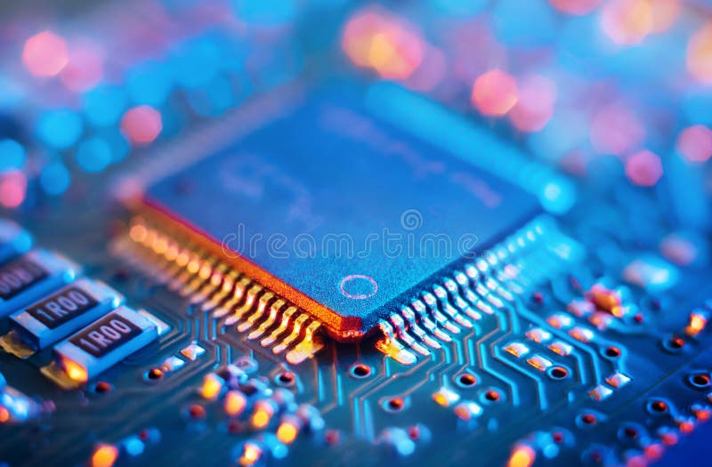 Computer Microchips and Processors on Electronic circuit board. Abstract technology microelectronics concept background. royalty free stock image Computer Microchips and Processors on Electronic circuit board. Abstract technology microelectronics concept background. royalty free stock image
