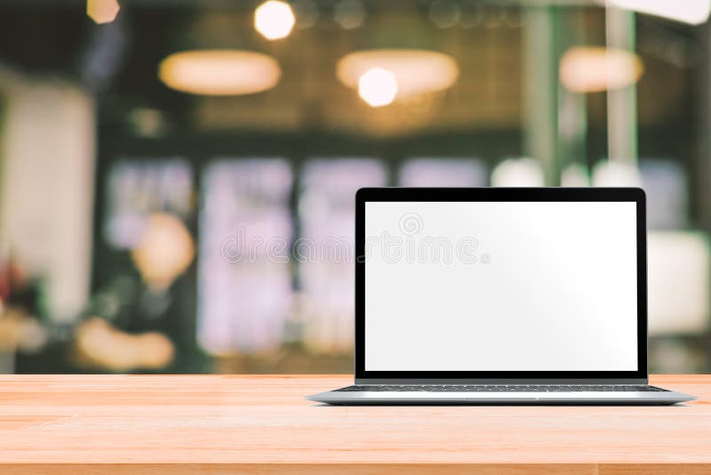 Laptop with blank screen placed on white wooden table in blurred people in coffee shop or restaurant for menu or order receipt from computer. Laptop with blank screen placed on white wooden table in blurred people in coffee shop or restaurant for menu or order receipt from computer.