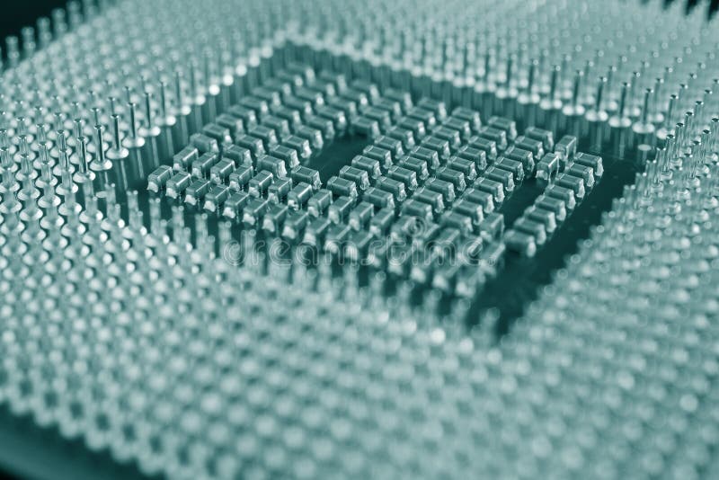 Computer processor close-up. Dark blue green tinted background or backdrop. Wallpaper on the theme of information technology. A stock images