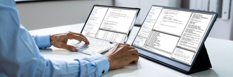 Computer Programmer Writing Program Code On Computer. In Office. Debug program stock images, royalty-free photos and pictures