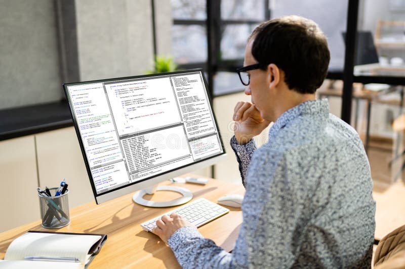 Computer Programmer Writing Program Code on Computer Stock Image ...