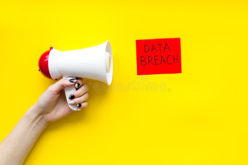 Computer system protection from hacker with data breach copy and speaking trumpet on yellow background top view mockup stock photo Computer system protection from hacker with data breach copy and speaking trumpet on yellow background top view mockup stock photo