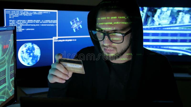 Hacker Stands In Front Of Screen Controlling The World. Free Stock Video  Footage Download Clips Technology