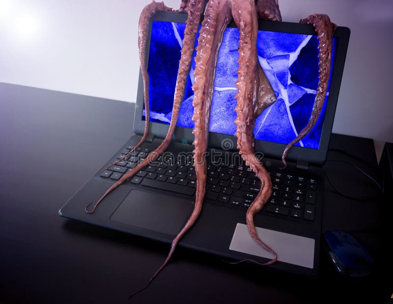 Computer virus concept. Laptop with broken screen seized by disgusting monster with long sticky tentacles. Computer virus concept. Laptop with broken screen seized by disgusting monster with long sticky tentacles