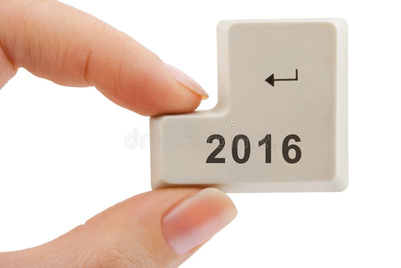 Computer button 2016 in hand isolated on white background. Computer button 2016 in hand isolated on white background