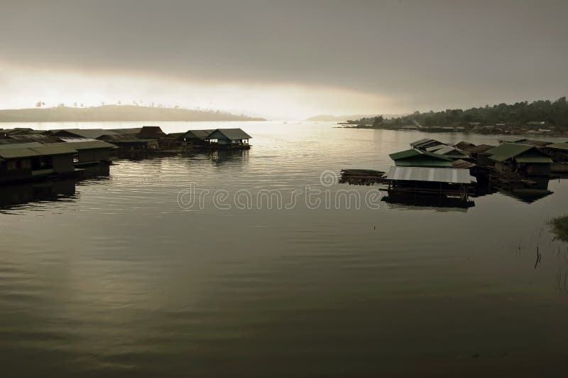 Local community onthe shore of a Thai reservoir. Local community onthe shore of a Thai reservoir