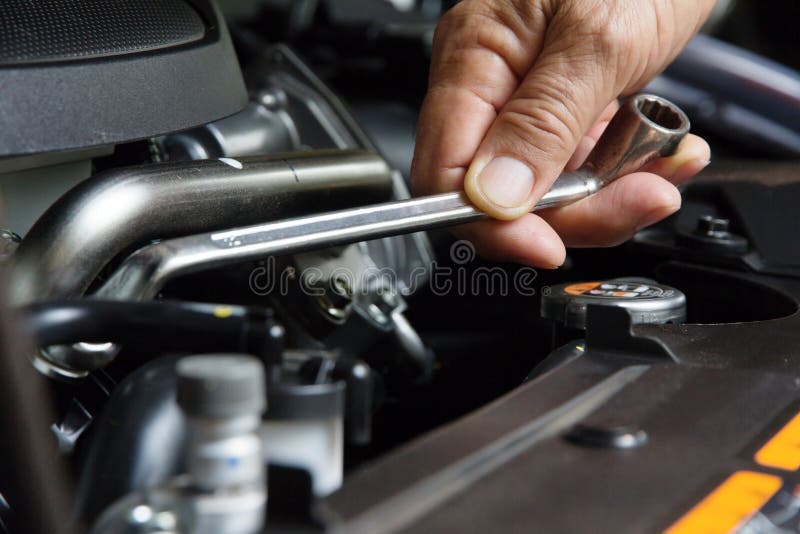 Professional car mechanic, auto repair concept. Professional car mechanic, auto repair concept