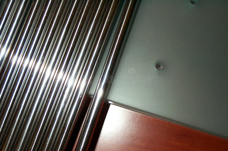 Close shot of a steel bars + opaque glass composition. Close shot of a steel bars + opaque glass composition.