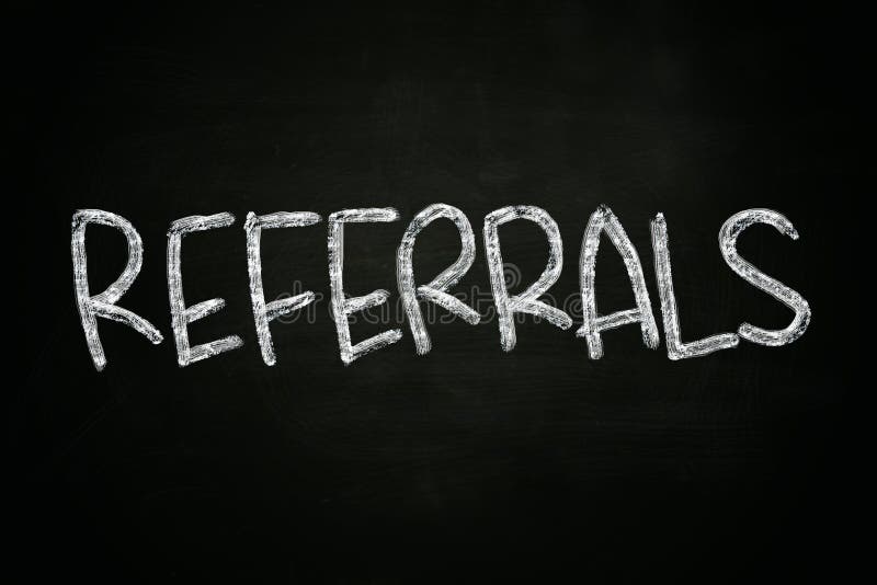 The word referrals written with chalk on blackboard. The word referrals written with chalk on blackboard