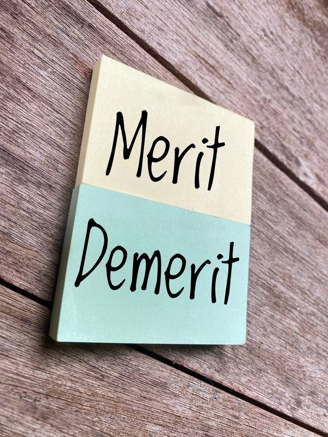 Conceito de Mérito e Demérito fotografia de stock